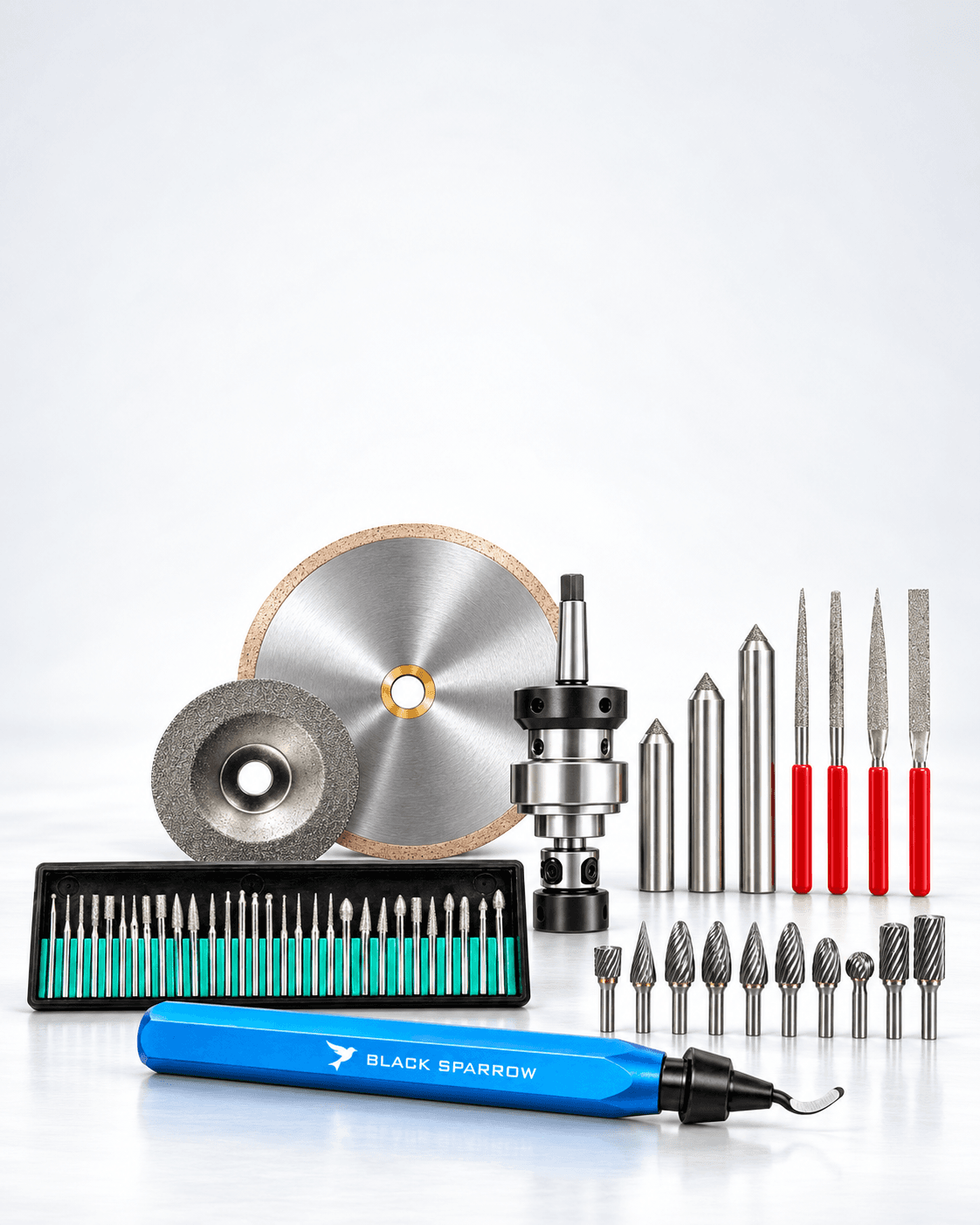 Industrial tooling including a boxed set of mounted points, a diamond cup wheel, a diamond cutting blade, a tapping attachment, diamond dressers, diamond needle files, burrs and a BLACK SPARROW deburring handle.